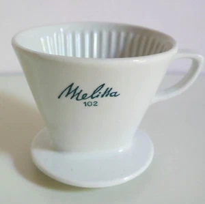 Porzellanfilter Kaffeefilter MELITTA 102, grüner Schriftzug mit 4 Löchern - Bild 1 von 3