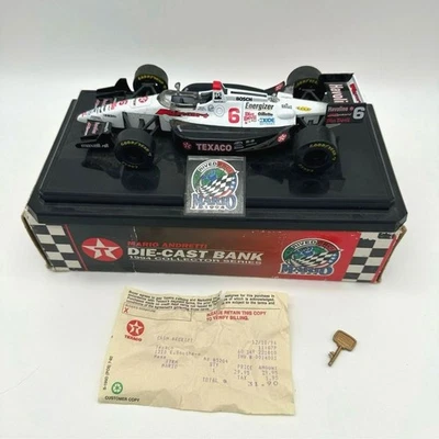 Banco de monedas fundidas a presión Mario Andretti Texaco 1994 modelo Dirt Devil Indy Car Foto 1 de 4