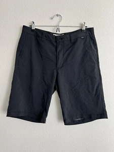 Pantalones cortos de golf Travis Mathew para hombre frente plano gris talla 34 rendimiento elásticos - Imagen 1 de 3