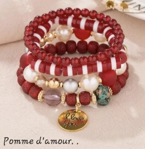 Mehrreihiges Armband rote Perlen und seine Charms, elastisch. Elegant. Neu - Bild 1 von 2