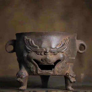Antigua estufa de carbón de hierro con cabeza de bestia tetera pieza de arte decorativo - Imagen 1 de 9