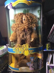 BRASS KEY WIZARD OF OZ PORCELAIN DOLL COWARDLY LION - Picture 1 of 11
