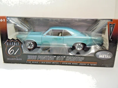Highway 61 1/18 Scale 1966 Turquoise Pontiac GTO Diecast - Image 1 of 4