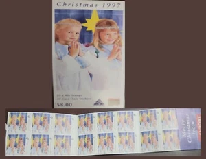 EL)1997 AUSTRALIA, CHRISTMAS THEMED WALLET AND BOUCLET OF 16 ADHESIVE STAMPS OF - Picture 1 of 1
