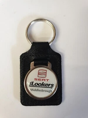 SEAT LOOKERS CAR MEMORABILIA COLLECTIBLE KEY FOB KEY RING LEATHER AUTOMOTIVE KEY - Image 1 of 3