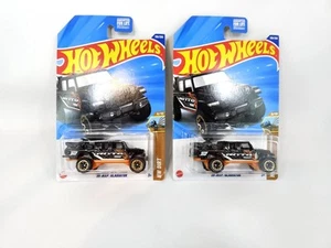 🔹 Lote de 2 Jeep Gladiator 4x4 Hot Wheels 2025 negro suciedad/naranja 1:64 - Imagen 1 de 13