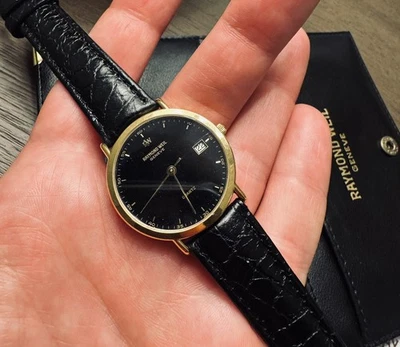 ICÓNICO RELOJ DE CUARZO RAYMOND WIL GENEVE HECHO EN SUIZA AÑOS 80 ESFERA NEGRA RARO Y COMO NUEVO  Foto 1 de 4