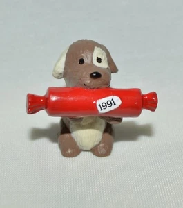 1991 SELLO - CACHORRO CON REGALO - FELIZ NAVIDAD MINIATURA CON ETIQUETA DORADA - Imagen 1 de 1