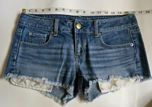 American Eagle Distressed Denim Blue Jean Sparkle Star Pockets Womens Short Sz 4 - Picture 1 of 12