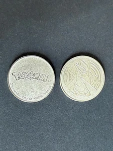 2 Pokemon TCG Spielzeug - Wizards Holo Sammler Metall Münzen LUGIA 2001 - Bild 1 von 2