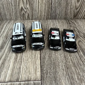 Disney Pixar Cars Richard Clayton Kensington Security SUV & Rescue Trooper - Picture 1 of 14