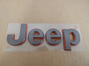 New OEM 2016-2018 Jeep Cherokee Hood Emblem Nameplate Bronze / Red 68275655AB - Picture 1 of 3