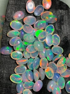 AAA Ethiopian Opal Oval Shape Colorful Loose Cabochon Rainbow Fire Opal Gemstone - Picture 1 of 5
