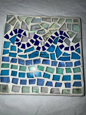 Vela de granero blanca mosaico remache azul onda playa Foto 1 de 4