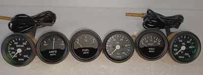 Smiths-52mm-Kit-Temp-Oil-Fuel-Oil Temp +Volt +Amp Gauges Black Bezel - Image 1 of 4