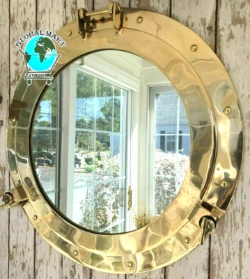 Espejo de ojo de buey con acabado de latón náutico antiguo de 24" para el hogar de pared de diseñador decorativo Foto 1 de 4