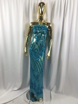 MALLA ELÉCTRICA ELÁSTICA TURQUESA 4 VÍAS BORDADA CON LENTEJUELAS-SE VENDE POR YARDA. Foto 1 de 4