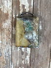 old crusty cow bell brass colored riveted loud