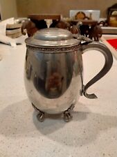Vintage/ Antique Pewter tankard with lid and lion paw feet. Heavy for its size.