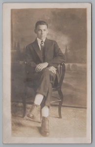 RPPC Dapper Gent Young Man Crossed Legs Posing Antique Studio Postcard 1910's - Picture 1 of 4
