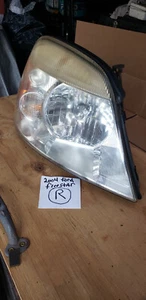 2004 FORD FREESTAR RIGHT SIDE(PASSENGER SIDE)) HEADLIGHT ASSY W/SLIDE MOUNT BARS - Picture 1 of 7
