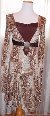 JUEGO DE FALDA ORNA FARHO 2 PIEZAS ESTAMPADO ANIMAL, FAB TOP COMBINACIÓN CON CINTURÓN DE CUERO Foto 1 de 4