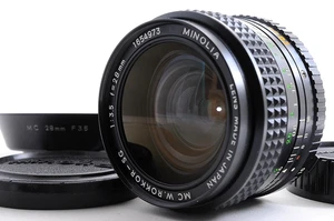 Lente gran angular Minolta MC W.Rokkor-SG 28mm F3.5 MF con capucha CASI COMO ... - Imagen 1 de 15