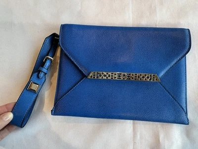 Bolso sin asas de muñeca Stella & Dot azul con interior divertido  Foto 1 de 4