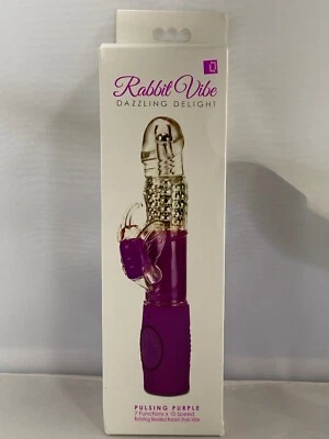 VIBRADOR TOPCO PÚRPURA DESLUMBRANTE DELEITE CUENTAS GIRATORIAS AMBIENTE CONEJO Foto 1 de 4