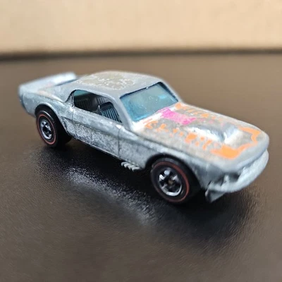Mustang Stocker 1974 vintage Hot Wheels cromado con rayas moradas y naranjas  Foto 1 de 4