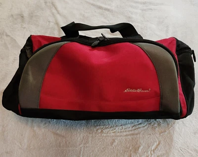 Bolso de mano Eddie Bauer 20" rojo y negro de lona para gimnasio con correa para el hombro Foto 1 de 4