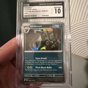 Tarjeta Pokémon CGC 10 GEMAS COMO NUEVA Umbreon 059/131 HOLO RARA Evoluciones Prismáticas - Imagen 1 de 8