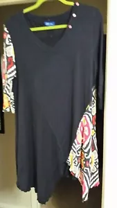 Black knit top size Large. Has abstract sleeve and bottom, shark tooth bottom - Picture 1 of 2