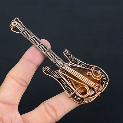 Colgante de guitarra con envoltura de alambre de cobre hecho a mano de piedras preciosas de ámbar báltico 4,53 para ella F403 Foto 1 de 4