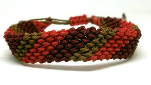 Pulsera Macrame Artesanal ( Abril 15º) - en hilo tonos marrón-naranja - Imagen 1 de 6