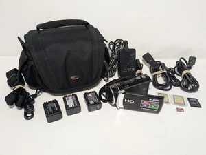 Sony Handycam HDR-CX210 schwarz kompakter digitaler Camcorder mit Akkufach Kabel - Bild 1 von 7
