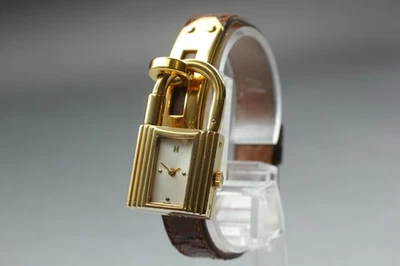 [Casi COMO NUEVO] HERMES Kelly Candado Estuche Dorado Marrón y Verde 2 Bandas Qz Reloj Mujer Foto 1 de 4