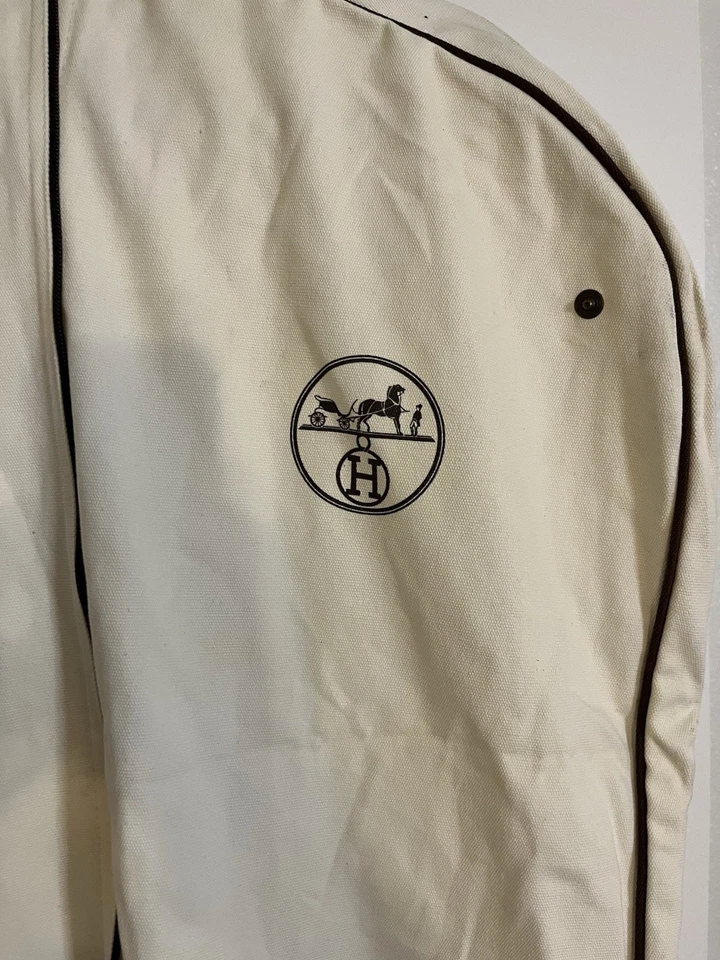 Bolso de ropa ecuestre beige Hermès con ribete de tubería Foto 1 de 3