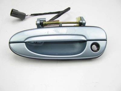 NEW - OUT OF BOX OEM 1996-2002 Mazda 626 FRONT LEFT Exterior Door Handle BLUE - Image 1 of 4