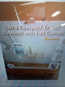 Delta Children EZ Fold Ultra Compact Travel Bassinet - Gray 682kb - Picture 1 of 2