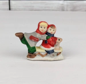 Christmas Village Ceramic Bisque Figure Children Playing on a Sled Snow 1.5"x2" - Picture 1 of 6