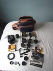 Lot of  misc camera lenses / cases paper  etc with carry bag