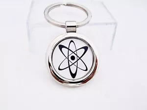 SÍMBOLO ATÓMICO QUÍMICA ATÓMICA FÍSICA NUCLEAR BIO RADIACIÓN LLAVERO CADENA - Imagen 1 de 3