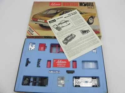 Schuco Volkswagen Passat montage modell 225 004 kit rosso in scatola w/ box 1/43 - Immagine 1 di 4