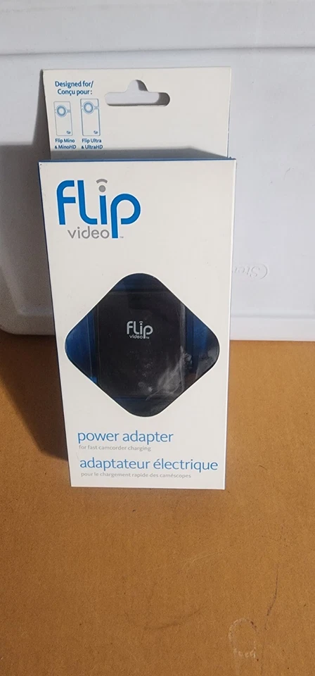 Nuevo adaptador de corriente Flip Video APA1B para carga rápida de videocámara Foto 1 de 4