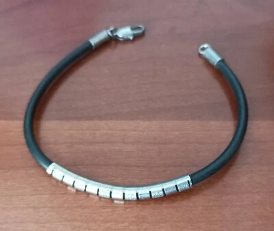 BRACCIALETTO CAUCCIU' E METALLO (ARGENTO?) ANNI NOVANTA LUNGHEZZA 19 CM PERFETTO - Immagine 1 di 4