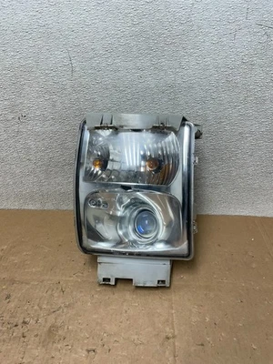 Luz antiniebla delantera izquierda conductor Cadillac STS 2005 a 2011 OEM V5044 DW Foto 1 de 4