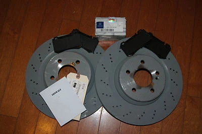 Rotores y pastillas de freno trasero originales Mercedes Benz E55 E63 CLS55 AMG OE 003420622041 Foto 1 de 2