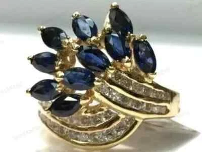 Anillo de compromiso de zafiro creado en laboratorio de corte marquesa de 4 quilates enchapado en oro amarillo de 14 quilates Foto 1 de 4