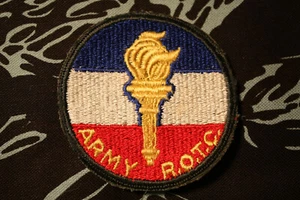 Parche de hombro de antorcha antiguo vintage senior ROTC anterior a la década de 1960 borde cortado sin usar GMA-NGC - Imagen 1 de 3